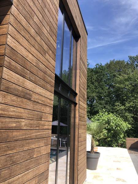 Service en extension maison ossature bois près de Lisieux
